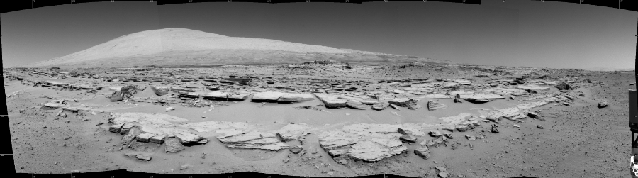 NASA's Mars rover Curiosity took 5 images in Gale Crater using its mast-mounted Right Navigation Camera (Navcam) to create this mosaic. The seam-corrected mosaic provides a 163-degree cylindrical projection panorama of the Martian surface centered at 163 degrees azimuth (measured clockwise from north). Curiosity took the images on February 20, 2014, Sol 548 of the Mars Science Laboratory mission at drive 802, site number 27. The local mean solar time for the image exposures was 1 PM. Each Navcam image has a 45 degree field of view. CREDIT: NASA/JPL-Caltech