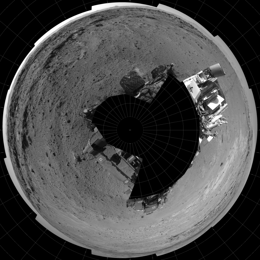 NASA's Mars rover Curiosity took 19 images in Gale Crater using its mast-mounted Left Navigation Camera (Navcam) to create this mosaic. The seam-corrected mosaic provides a polar stereographic projection panorama of the Martian surface with 0 degrees azimuth (measured clockwise from north) at the top of the image. Curiosity took the images on February 24, 2014, Sol 552 of the Mars Science Laboratory mission at drive 0, site number 28. The local mean solar time for the image exposures was 2 PM. Each Navcam image has a 45-degree field of view. CREDIT: NASA/JPL-Caltech