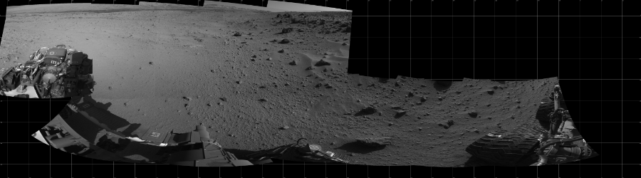 NASA's Mars rover Curiosity took 12 images in Gale Crater using its mast-mounted Left Navigation Camera (Navcam) to create this mosaic. The seam-corrected mosaic provides a 303-degree cylindrical projection panorama of the Martian surface centered at 238 degrees azimuth (measured clockwise from north). Curiosity took the images on February 27, 2014, Sol 555 of the Mars Science Laboratory mission at drive 634, site number 28. The local mean solar time for the image exposures was 3 PM. Each Navcam image has a 45 degree field of view. CREDIT: NASA/JPL-Caltech