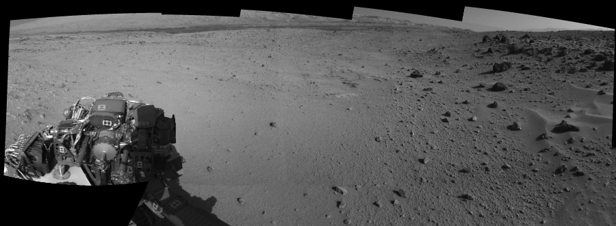 NASA's Mars rover Curiosity took 12 images in Gale Crater using its mast-mounted Left Navigation Camera (Navcam) to create this mosaic. The seam-corrected mosaic provides a 166-degree cylindrical-perspective projection panorama of the Martian surface suitable for stereo viewing, centered at 350 degrees azimuth (measured clockwise from north). This single-eye view must be combined with the partner right image to be viewed in stereo.  Curiosity took the images on February 27, 2014, Sol 555 of the Mars Science Laboratory mission at drive 634, site number 28. The local mean solar time for the image exposures was 3 PM. Each Navcam image has a 45-degree field of view. CREDIT: NASA/JPL-Caltech