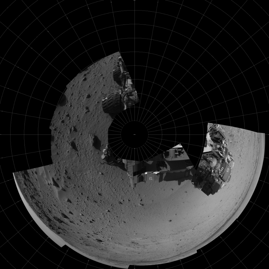 NASA's Mars rover Curiosity took 12 images in Gale Crater using its mast-mounted Left Navigation Camera (Navcam) to create this mosaic. The seam-corrected mosaic provides a polar stereographic projection panorama of the Martian surface with 0 degrees azimuth (measured clockwise from north) at the top of the image. Curiosity took the images on February 27, 2014, Sol 555 of the Mars Science Laboratory mission at drive 634, site number 28. The local mean solar time for the image exposures was 3 PM. Each Navcam image has a 45-degree field of view. CREDIT: NASA/JPL-Caltech