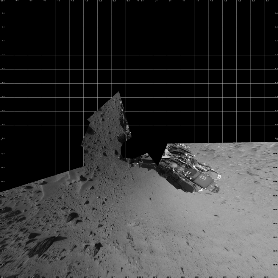 NASA's Mars rover Curiosity took 12 images in Gale Crater using its mast-mounted Left Navigation Camera (Navcam) to create this mosaic. The seam-corrected mosaic provides a vertical projection of the Martian surface near the rover, covering an area of 20 meters (north/south) by 20 meters (east/west). North is up in the image. This projection provides an overhead view, but introduces distortion for items not on the surface, such as large rocks and the rover itself.  Curiosity took the images on February 27, 2014, Sol 555 of the Mars Science Laboratory mission at drive 634, site number 28. The local mean solar time for the image exposures was 3 PM. Each Navcam image has a 45-degree field of view. CREDIT: NASA/JPL-Caltech
