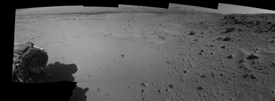 NASA's Mars rover Curiosity took 12 images in Gale Crater using its mast-mounted Right Navigation Camera (Navcam) to create this mosaic. The seam-corrected mosaic provides a 166-degree cylindrical-perspective projection panorama of the Martian surface suitable for stereo viewing, centered at 343 degrees azimuth (measured clockwise from north). This single-eye view must be combined with the partner left image to be viewed in stereo. Curiosity took the images on February 27, 2014, Sol 555 of the Mars Science Laboratory mission at drive 634, site number 28. The local mean solar time for the image exposures was 3 PM. Each Navcam image has a 45-degree field of view. CREDIT: NASA/JPL-Caltech