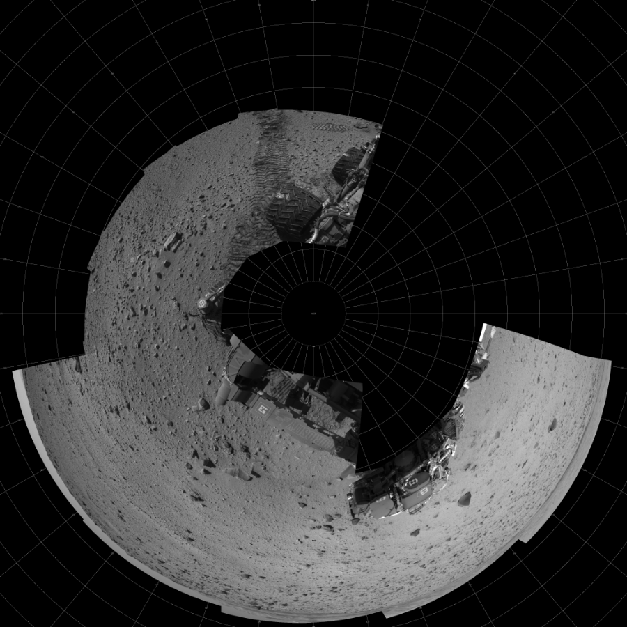 NASA's Mars rover Curiosity took 12 images in Gale Crater using its mast-mounted Left Navigation Camera (Navcam) to create this mosaic. The seam-corrected mosaic provides a polar stereographic projection panorama of the Martian surface with 0 degrees azimuth (measured clockwise from north) at the top of the image. Curiosity took the images on March 04, 2014, Sol 559 of the Mars Science Laboratory mission at drive 914, site number 28. The local mean solar time for the image exposures was 2 PM. Each Navcam image has a 45-degree field of view. CREDIT: NASA/JPL-Caltech