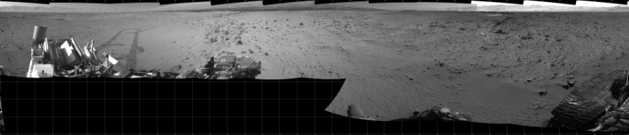 NASA's Mars rover Curiosity took 17 images in Gale Crater using its mast-mounted Left Navigation Camera (Navcam) to create this mosaic. The seam-corrected mosaic provides a 360-degree cylindrical projection panorama of the Martian surface centered at 180 degrees azimuth (measured clockwise from north). Curiosity took the images on March 06, 2014, Sol 561 of the Mars Science Laboratory mission at drive 1350, site number 28. The local mean solar time for the image exposures was 2 PM. Each Navcam image has a 45 degree field of view. CREDIT: NASA/JPL-Caltech