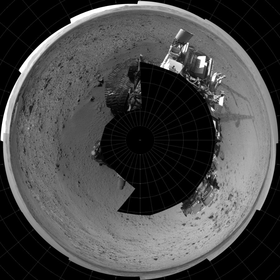 NASA's Mars rover Curiosity took 17 images in Gale Crater using its mast-mounted Left Navigation Camera (Navcam) to create this mosaic. The seam-corrected mosaic provides a polar stereographic projection panorama of the Martian surface with 0 degrees azimuth (measured clockwise from north) at the top of the image. Curiosity took the images on March 06, 2014, Sol 561 of the Mars Science Laboratory mission at drive 1350, site number 28. The local mean solar time for the image exposures was 2 PM. Each Navcam image has a 45-degree field of view. CREDIT: NASA/JPL-Caltech