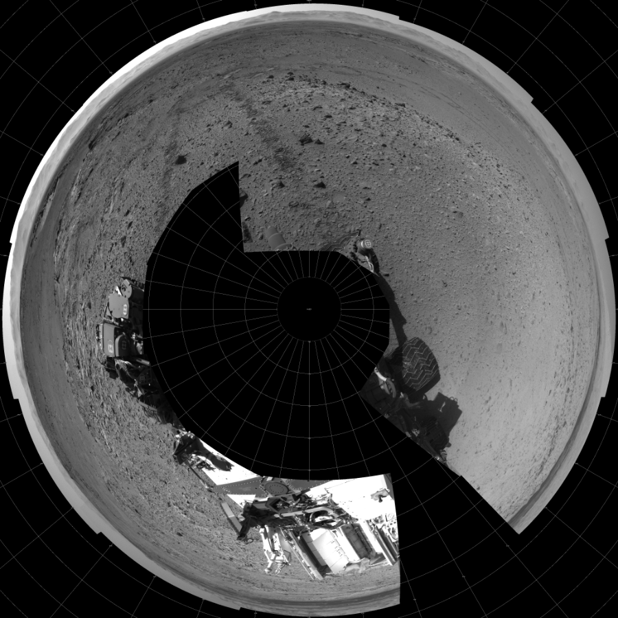 NASA's Mars rover Curiosity took 16 images in Gale Crater using its mast-mounted Left Navigation Camera (Navcam) to create this mosaic. The seam-corrected mosaic provides a polar stereographic projection panorama of the Martian surface with 0 degrees azimuth (measured clockwise from north) at the top of the image. Curiosity took the images on March 08, 2014, Sol 563 of the Mars Science Laboratory mission at drive 0, site number 29. The local mean solar time for the image exposures was from 2 PM to 3 PM. Each Navcam image has a 45-degree field of view. CREDIT: NASA/JPL-Caltech