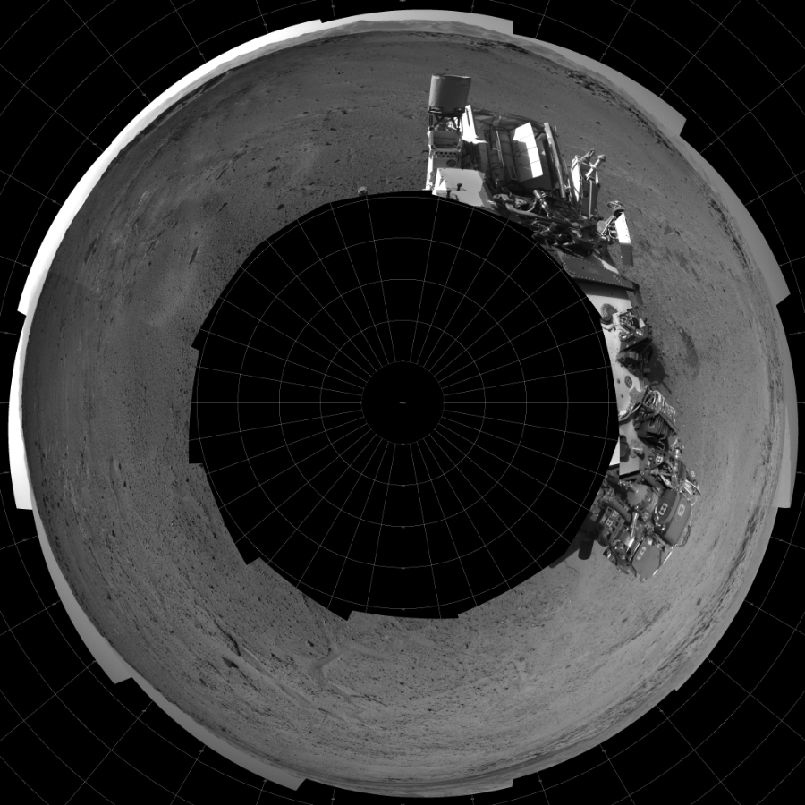 NASA's Mars rover Curiosity took 12 images in Gale Crater using its mast-mounted Left Navigation Camera (Navcam) to create this mosaic. The seam-corrected mosaic provides a polar stereographic projection panorama of the Martian surface with 0 degrees azimuth (measured clockwise from north) at the top of the image. Curiosity took the images on March 09, 2014, Sol 564 of the Mars Science Laboratory mission at drive 298, site number 29. The local mean solar time for the image exposures was from 2 PM to 4 PM. Each Navcam image has a 45-degree field of view. CREDIT: NASA/JPL-Caltech