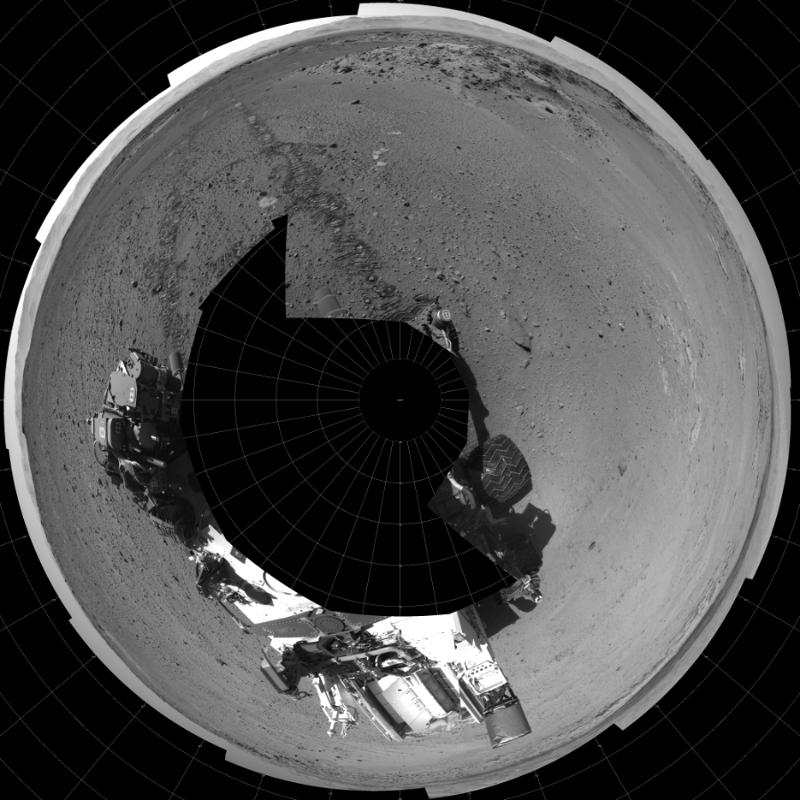 NASA's Mars rover Curiosity took 17 images in Gale Crater using its mast-mounted Left Navigation Camera (Navcam) to create this mosaic. The seam-corrected mosaic provides a polar stereographic projection panorama of the Martian surface with 0 degrees azimuth (measured clockwise from north) at the top of the image. Curiosity took the images on March 13, 2014, Sol 568 of the Mars Science Laboratory mission at drive 1020, site number 29. The local mean solar time for the image exposures was 2 PM. Each Navcam image has a 45-degree field of view. CREDIT: NASA/JPL-Caltech