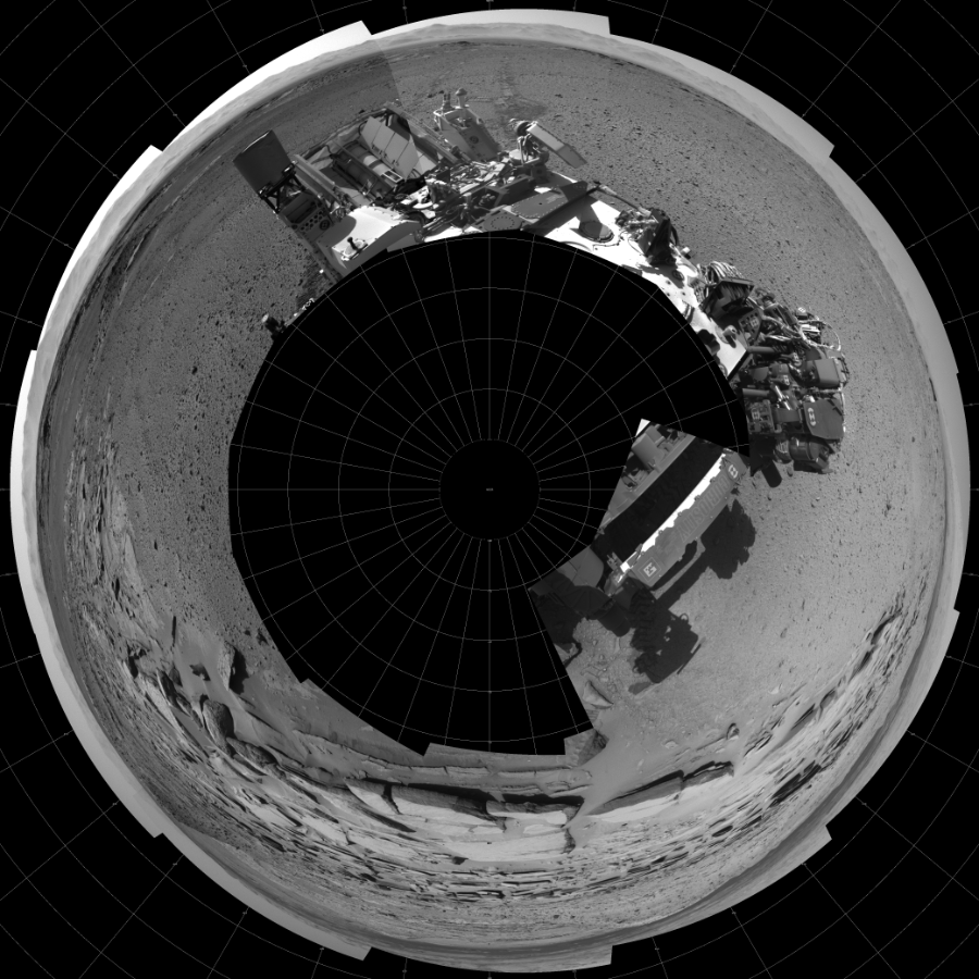 NASA's Mars rover Curiosity took 14 images in Gale Crater using its mast-mounted Left Navigation Camera (Navcam) to create this mosaic. The seam-corrected mosaic provides a polar stereographic projection panorama of the Martian surface with 0 degrees azimuth (measured clockwise from north) at the top of the image. Curiosity took the images on March 31, 2014, Sol 586 of the Mars Science Laboratory mission at drive 820, site number 30. The local mean solar time for the image exposures was 2 PM. Each Navcam image has a 45-degree field of view. CREDIT: NASA/JPL-Caltech