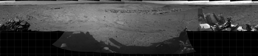 NASA's Mars rover Curiosity took 17 images in Gale Crater using its mast-mounted Left Navigation Camera (Navcam) to create this mosaic. The seam-corrected mosaic provides a 360-degree cylindrical projection panorama of the Martian surface centered at 180 degrees azimuth (measured clockwise from north). Curiosity took the images on April 01, 2014, Sol 587 of the Mars Science Laboratory mission at drive 938, site number 30. The local mean solar time for the image exposures was from 2 PM to 3 PM. Each Navcam image has a 45 degree field of view. CREDIT: NASA/JPL-Caltech
