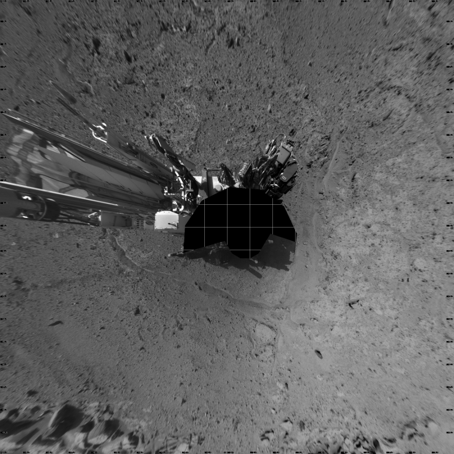 NASA's Mars rover Curiosity took 17 images in Gale Crater using its mast-mounted Left Navigation Camera (Navcam) to create this mosaic. The seam-corrected mosaic provides a vertical projection of the Martian surface near the rover, covering an area of 20 meters (north/south) by 20 meters (east/west). North is up in the image. This projection provides an overhead view, but introduces distortion for items not on the surface, such as large rocks and the rover itself.  Curiosity took the images on April 01, 2014, Sol 587 of the Mars Science Laboratory mission at drive 938, site number 30. The local mean solar time for the image exposures was from 2 PM to 3 PM. Each Navcam image has a 45-degree field of view. CREDIT: NASA/JPL-Caltech