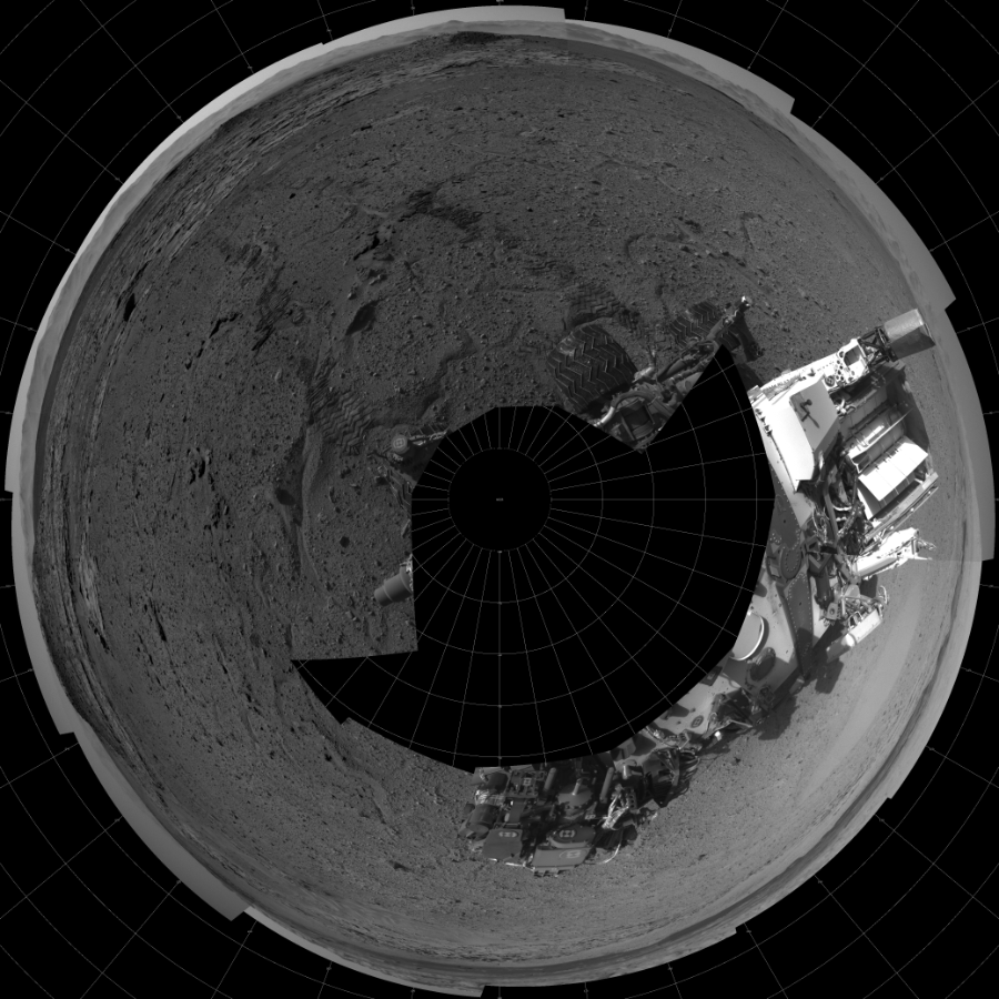 NASA's Mars rover Curiosity took 17 images in Gale Crater using its mast-mounted Left Navigation Camera (Navcam) to create this mosaic. The seam-corrected mosaic provides a polar stereographic projection panorama of the Martian surface with 0 degrees azimuth (measured clockwise from north) at the top of the image. Curiosity took the images on April 10, 2014, Sol 595 of the Mars Science Laboratory mission at drive 538, site number 31. The local mean solar time for the image exposures was from 2 PM to 4 PM. Each Navcam image has a 45-degree field of view. CREDIT: NASA/JPL-Caltech