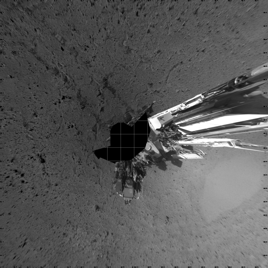 NASA's Mars rover Curiosity took 17 images in Gale Crater using its mast-mounted Left Navigation Camera (Navcam) to create this mosaic. The seam-corrected mosaic provides a vertical projection of the Martian surface near the rover, covering an area of 20 meters (north/south) by 20 meters (east/west). North is up in the image. This projection provides an overhead view, but introduces distortion for items not on the surface, such as large rocks and the rover itself.  Curiosity took the images on April 10, 2014, Sol 595 of the Mars Science Laboratory mission at drive 538, site number 31. The local mean solar time for the image exposures was from 2 PM to 4 PM. Each Navcam image has a 45-degree field of view. CREDIT: NASA/JPL-Caltech