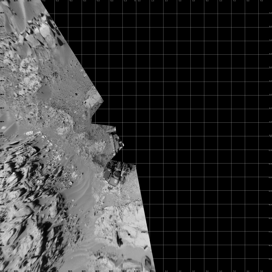 NASA's Mars rover Curiosity took 7 images in Gale Crater using its mast-mounted Left Navigation Camera (Navcam) to create this mosaic. The seam-corrected mosaic provides a vertical projection of the Martian surface near the rover, covering an area of 20 meters (north/south) by 20 meters (east/west). North is up in the image. This projection provides an overhead view, but introduces distortion for items not on the surface, such as large rocks and the rover itself. Curiosity took the images on April 12, 2014, Sol 597 of the Mars Science Laboratory mission at drive 718, site number 31. The local mean solar time for the image exposures was from 1 PM to 2 PM. Each Navcam image has a 45-degree field of view. CREDIT: NASA/JPL-Caltech