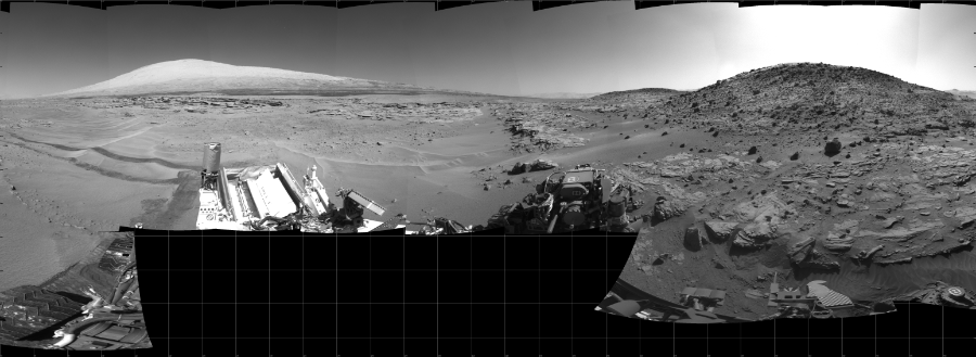 NASA's Mars rover Curiosity took 32 images in Gale Crater using its mast-mounted Left Navigation Camera (Navcam) to create this mosaic. The seam-corrected mosaic provides a 290-degree cylindrical projection panorama of the Martian surface centered at 215 degrees azimuth (measured clockwise from north). Curiosity took the images on May 06, 2014, Sols 621-609 of the Mars Science Laboratory mission at drive 1330, site number 31. The local mean solar time for the image exposures was from 1 PM to 2 PM. Each Navcam image has a 45 degree field of view. CREDIT: NASA/JPL-Caltech