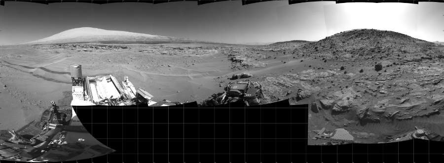 NASA's Mars rover Curiosity took 32 images in Gale Crater using its mast-mounted Right Navigation Camera (Navcam) to create this mosaic. The seam-corrected mosaic provides a 290-degree cylindrical projection panorama of the Martian surface centered at 215 degrees azimuth (measured clockwise from north). Curiosity took the images on May 06, 2014, Sols 621-609 of the Mars Science Laboratory mission at drive 1330, site number 31. The local mean solar time for the image exposures was from 1 PM to 2 PM. Each Navcam image has a 45 degree field of view. CREDIT: NASA/JPL-Caltech