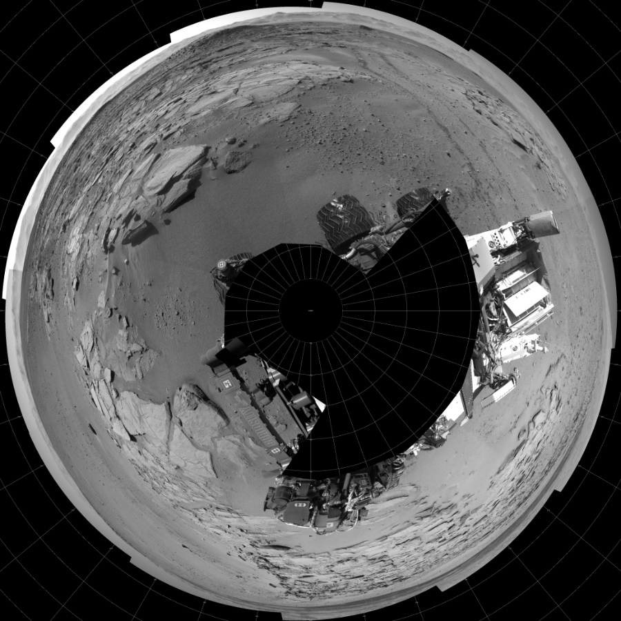 NASA's Mars rover Curiosity took 18 images in Gale Crater using its mast-mounted Left Navigation Camera (Navcam) to create this mosaic. The seam-corrected mosaic provides a polar stereographic projection panorama of the Martian surface with 0 degrees azimuth (measured clockwise from north) at the top of the image. Curiosity took the images on May 17, 2014, Sol 631 of the Mars Science Laboratory mission at drive 0, site number 32. The local mean solar time for the image exposures was from 1 PM to 2 PM. Each Navcam image has a 45-degree field of view. CREDIT: NASA/JPL-Caltech
