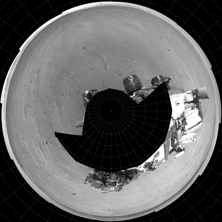 NASA's Mars rover Curiosity took 17 images in Gale Crater using its mast-mounted Left Navigation Camera (Navcam) to create this mosaic. The seam-corrected mosaic provides a polar stereographic projection panorama of the Martian surface with 0 degrees azimuth (measured clockwise from north) at the top of the image. Curiosity took the images on May 29, 2014, Sol 643 of the Mars Science Laboratory mission at drive 660, site number 33. The local mean solar time for the image exposures was 1 PM. Each Navcam image has a 45-degree field of view. CREDIT: NASA/JPL-Caltech