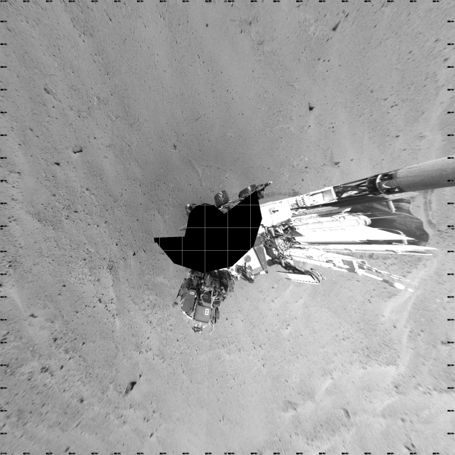 NASA's Mars rover Curiosity took 17 images in Gale Crater using its mast-mounted Left Navigation Camera (Navcam) to create this mosaic. The seam-corrected mosaic provides a vertical projection of the Martian surface near the rover, covering an area of 20 meters (north/south) by 20 meters (east/west). North is up in the image. This projection provides an overhead view, but introduces distortion for items not on the surface, such as large rocks and the rover itself.  Curiosity took the images on May 29, 2014, Sol 643 of the Mars Science Laboratory mission at drive 660, site number 33. The local mean solar time for the image exposures was 1 PM. Each Navcam image has a 45-degree field of view. CREDIT: NASA/JPL-Caltech