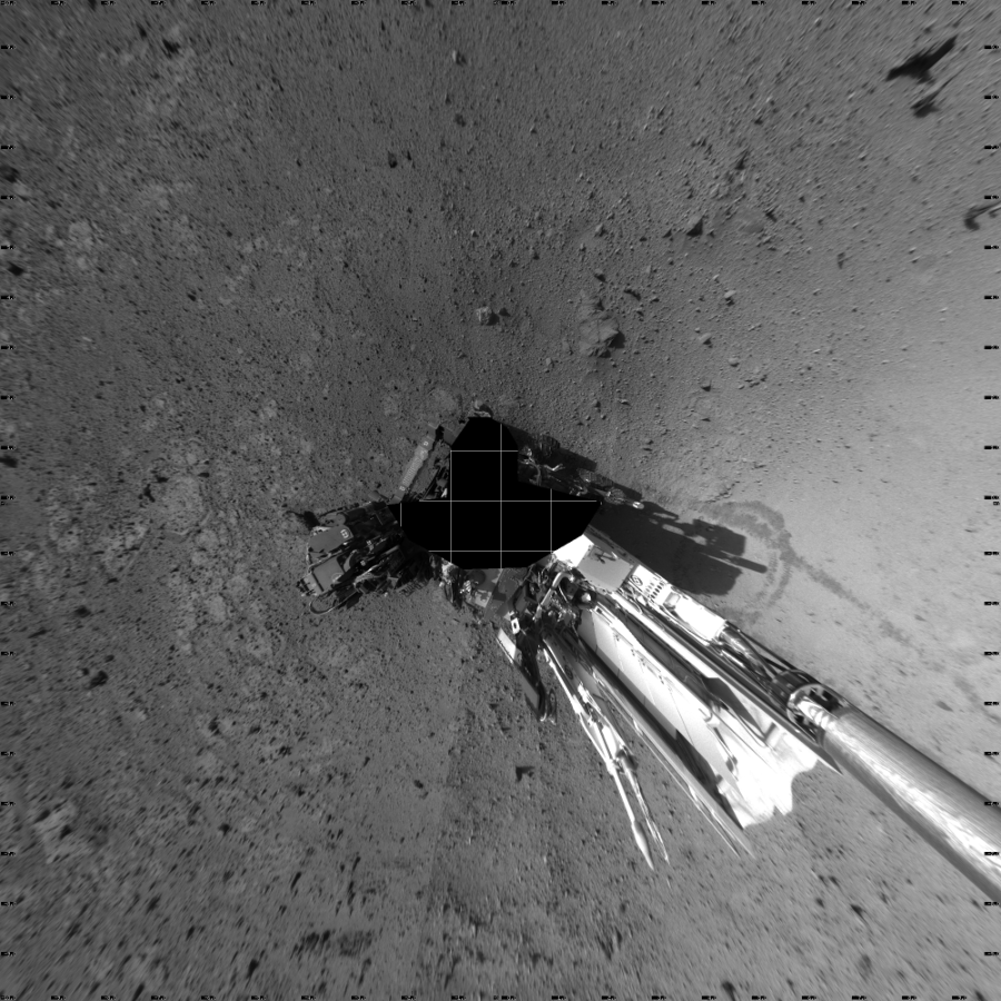 NASA's Mars rover Curiosity took 19 images in Gale Crater using its mast-mounted Left Navigation Camera (Navcam) to create this mosaic. The seam-corrected mosaic provides a vertical projection of the Martian surface near the rover, covering an area of 20 meters (north/south) by 20 meters (east/west). North is up in the image. This projection provides an overhead view, but introduces distortion for items not on the surface, such as large rocks and the rover itself.  Curiosity took the images on June 02, 2014, Sol 647 of the Mars Science Laboratory mission at drive 0, site number 34. The local mean solar time for the image exposures was from 2 PM to 4 PM. Each Navcam image has a 45-degree field of view. CREDIT: NASA/JPL-Caltech