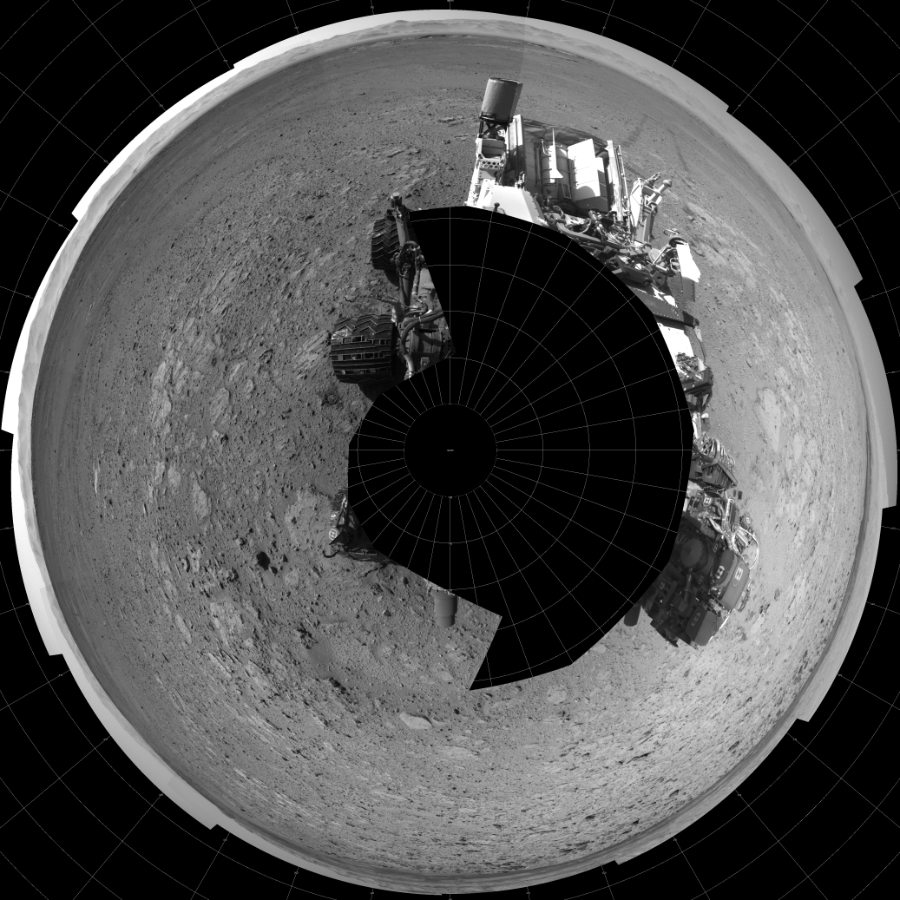NASA's Mars rover Curiosity took 17 images in Gale Crater using its mast-mounted Left Navigation Camera (Navcam) to create this mosaic. The seam-corrected mosaic provides a polar stereographic projection panorama of the Martian surface with 0 degrees azimuth (measured clockwise from north) at the top of the image. Curiosity took the images on June 06, 2014, Sol 651 of the Mars Science Laboratory mission at drive 416, site number 34. The local mean solar time for the image exposures was 2 PM. Each Navcam image has a 45-degree field of view. CREDIT: NASA/JPL-Caltech