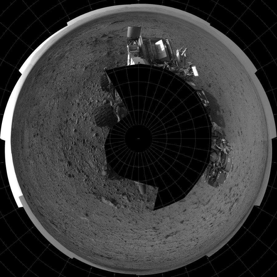 NASA's Mars rover Curiosity took 17 images in Gale Crater using its mast-mounted Left Navigation Camera (Navcam) to create this mosaic. The seam-corrected mosaic provides a polar stereographic projection panorama of the Martian surface with 0 degrees azimuth (measured clockwise from north) at the top of the image. Curiosity took the images on July 22, 2014, Sol 696 of the Mars Science Laboratory mission at drive 1552, site number 39. The local mean solar time for the image exposures was from 1 PM to 4 PM. Each Navcam image has a 45-degree field of view. CREDIT: NASA/JPL-Caltech
