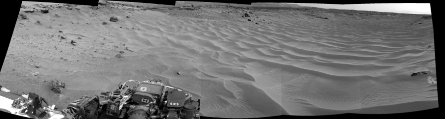 NASA's Mars rover Curiosity took 5 images in Gale Crater using its mast-mounted Left Navigation Camera (Navcam) to create this mosaic. The seam-corrected mosaic provides a 172-degree cylindrical projection panorama of the Martian surface centered at 164 degrees azimuth (measured clockwise from north). Curiosity took the images on August 02, 2014, Sol 706 of the Mars Science Laboratory mission at drive 200, site number 40. The local mean solar time for the image exposures was 2 PM. Each Navcam image has a 45 degree field of view. CREDIT: NASA/JPL-Caltech