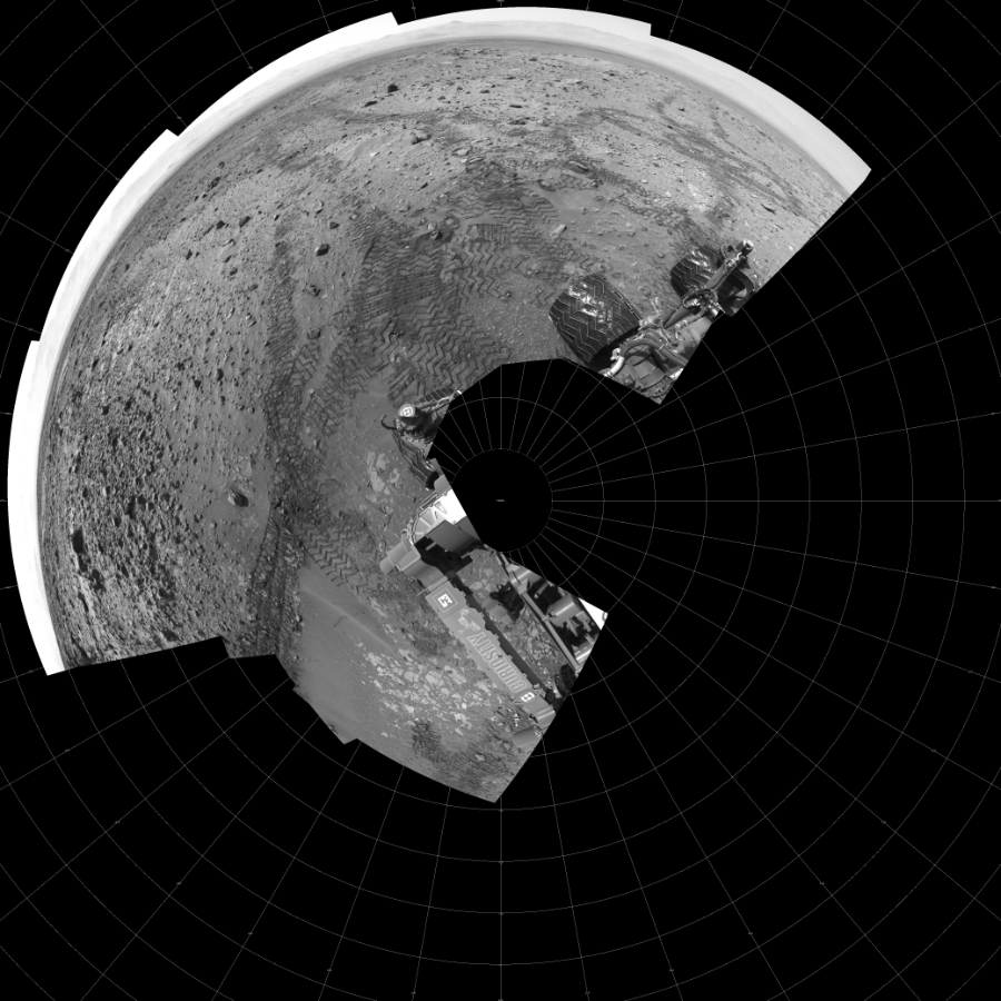 NASA's Mars rover Curiosity took 12 images in Gale Crater using its mast-mounted Left Navigation Camera (Navcam) to create this mosaic. The seam-corrected mosaic provides a polar stereographic projection panorama of the Martian surface with 0 degrees azimuth (measured clockwise from north) at the top of the image. Curiosity took the images on August 15, 2014, Sol 719 of the Mars Science Laboratory mission at drive 1378, site number 40. The local mean solar time for the image exposures was 1 PM. Each Navcam image has a 45-degree field of view. CREDIT: NASA/JPL-Caltech