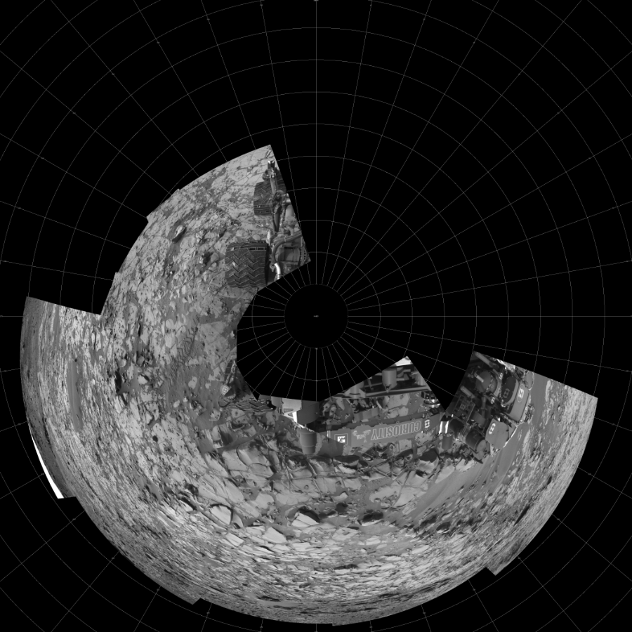 NASA's Mars rover Curiosity took 12 images in Gale Crater using its mast-mounted Left Navigation Camera (Navcam) to create this mosaic. The seam-corrected mosaic provides a polar stereographic projection panorama of the Martian surface with 0 degrees azimuth (measured clockwise from north) at the top of the image. Curiosity took the images on November 24, 2014, Sol 817 of the Mars Science Laboratory mission at drive 1828, site number 44. The local mean solar time for the image exposures was 1 PM. Each Navcam image has a 45-degree field of view. CREDIT: NASA/JPL-Caltech