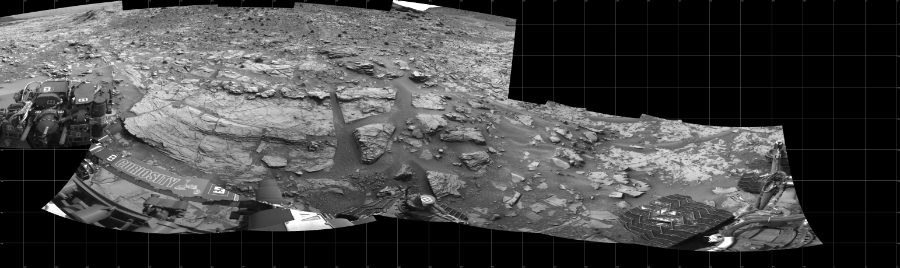 NASA's Mars rover Curiosity took 12 images in Gale Crater using its mast-mounted Left Navigation Camera (Navcam) to create this mosaic. The seam-corrected mosaic provides a 289-degree cylindrical projection panorama of the Martian surface centered at 237 degrees azimuth (measured clockwise from north). Curiosity took the images on December 03, 2014, Sol 826 of the Mars Science Laboratory mission at drive 2062, site number 44. The local mean solar time for the image exposures was 1 PM. Each Navcam image has a 45 degree field of view. CREDIT: NASA/JPL-Caltech