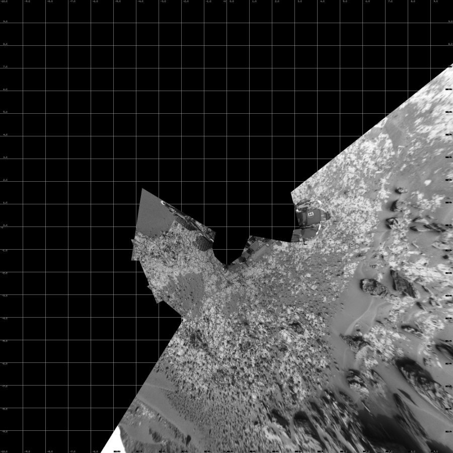 NASA's Mars rover Curiosity took 12 images in Gale Crater using its mast-mounted Left Navigation Camera (Navcam) to create this mosaic. The seam-corrected mosaic provides a vertical projection of the Martian surface near the rover, covering an area of 20 meters (north/south) by 20 meters (east/west). North is up in the image. This projection provides an overhead view, but introduces distortion for items not on the surface, such as large rocks and the rover itself.  Curiosity took the images on December 12, 2014, Sol 835 of the Mars Science Laboratory mission at drive 2336, site number 44. The local mean solar time for the image exposures was 2 PM. Each Navcam image has a 45-degree field of view. CREDIT: NASA/JPL-Caltech