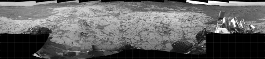 NASA's Mars rover Curiosity took 19 images in Gale Crater using its mast-mounted Left Navigation Camera (Navcam) to create this mosaic. The seam-corrected mosaic provides a 360-degree cylindrical projection panorama of the Martian surface centered at 180 degrees azimuth (measured clockwise from north). Curiosity took the images on January 11, 2015, Sol 864 of the Mars Science Laboratory mission at drive 0, site number 45. The local mean solar time for the image exposures was 3 PM. Each Navcam image has a 45 degree field of view. CREDIT: NASA/JPL-Caltech