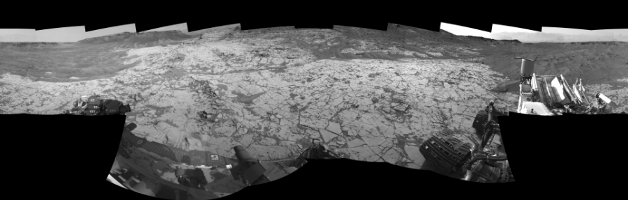 NASA's Mars rover Curiosity took 19 images in Gale Crater using its mast-mounted Left Navigation Camera (Navcam) to create this mosaic. The seam-corrected mosaic provides a 360-degree cylindrical-perspective projection panorama of the Martian surface suitable for stereo viewing, centered at 65 degrees azimuth (measured clockwise from north). This single-eye view must be combined with the partner right image to be viewed in stereo. Curiosity took the images on January 11, 2015, Sol 864 of the Mars Science Laboratory mission at drive 0, site number 45. The local mean solar time for the image exposures was 3 PM. Each Navcam image has a 45-degree field of view. CREDIT: NASA/JPL-Caltech