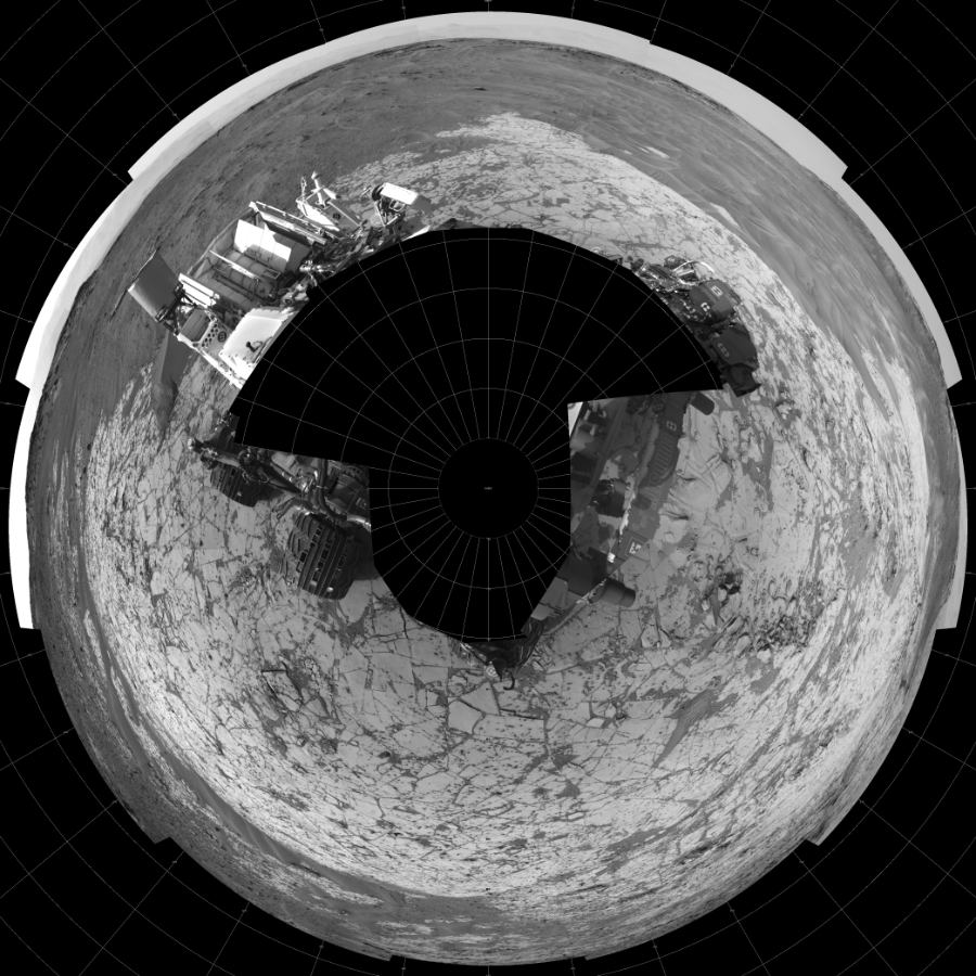 NASA's Mars rover Curiosity took 19 images in Gale Crater using its mast-mounted Left Navigation Camera (Navcam) to create this mosaic. The seam-corrected mosaic provides a polar stereographic projection panorama of the Martian surface with 0 degrees azimuth (measured clockwise from north) at the top of the image. Curiosity took the images on January 11, 2015, Sol 864 of the Mars Science Laboratory mission at drive 0, site number 45. The local mean solar time for the image exposures was 3 PM. Each Navcam image has a 45-degree field of view. CREDIT: NASA/JPL-Caltech