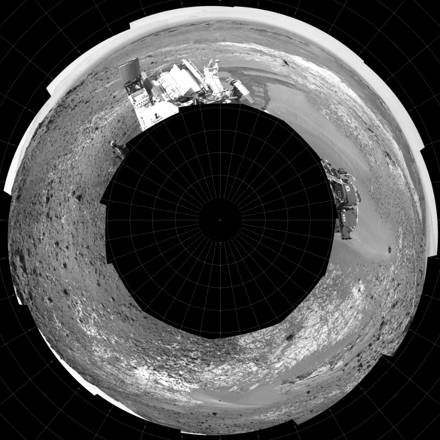 NASA's Mars rover Curiosity took 12 images in Gale Crater using its mast-mounted Left Navigation Camera (Navcam) to create this mosaic. The seam-corrected mosaic provides a polar stereographic projection panorama of the Martian surface with 0 degrees azimuth (measured clockwise from north) at the top of the image. Curiosity took the images on March 14, 2015, Sol 924 of the Mars Science Laboratory mission at drive 774, site number 45. The local mean solar time for the image exposures was 2 PM. Each Navcam image has a 45-degree field of view. CREDIT: NASA/JPL-Caltech