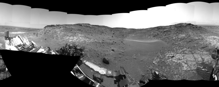 NASA's Mars rover Curiosity took 31 images in Gale Crater using its mast-mounted Left Navigation Camera (Navcam) to create this mosaic. The seam-corrected mosaic provides a 360-degree cylindrical-perspective projection panorama of the Martian surface suitable for stereo viewing, centered at 357 degrees azimuth (measured clockwise from north). This single-eye view must be combined with the partner right image to be viewed in stereo.  Curiosity took the images on March 30, 2015, Sol 940 of the Mars Science Laboratory mission at drive 996, site number 45. The local mean solar time for the image exposures was 3 PM. Each Navcam image has a 45-degree field of view. CREDIT: NASA/JPL-Caltech