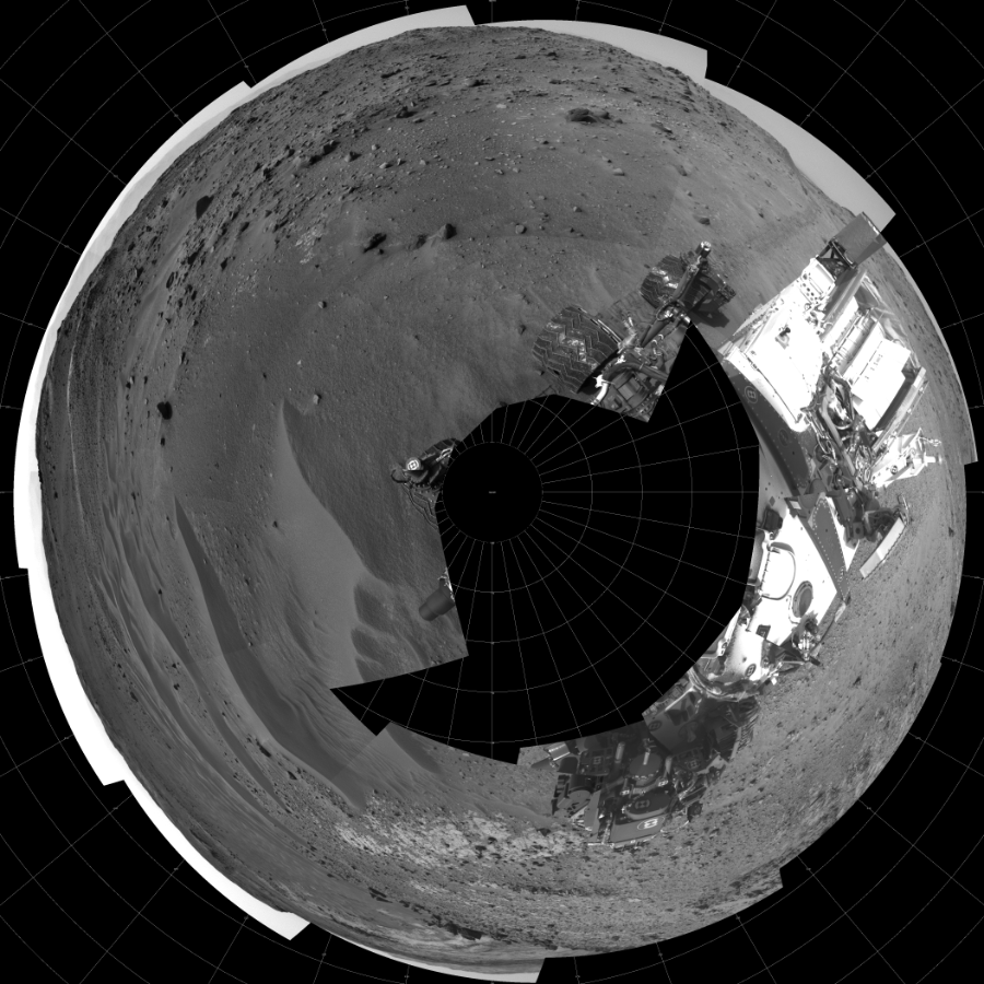 NASA's Mars rover Curiosity took 18 images in Gale Crater using its mast-mounted Left Navigation Camera (Navcam) to create this mosaic. The seam-corrected mosaic provides a polar stereographic projection panorama of the Martian surface with 0 degrees azimuth (measured clockwise from north) at the top of the image. Curiosity took the images on April 10, 2015, Sol 951 of the Mars Science Laboratory mission at drive 1696, site number 45. The local mean solar time for the image exposures was 4 PM. Each Navcam image has a 45-degree field of view. CREDIT: NASA/JPL-Caltech