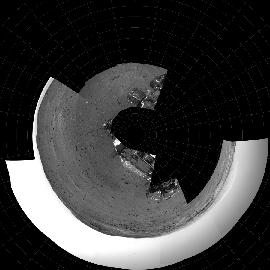 NASA's Mars rover Curiosity took 17 images in Gale Crater using its mast-mounted Left Navigation Camera (Navcam) to create this mosaic. The seam-corrected mosaic provides a polar stereographic projection panorama of the Martian surface with 0 degrees azimuth (measured clockwise from north) at the top of the image. Curiosity took the images on April 11, 2015, Sol 952 of the Mars Science Laboratory mission at drive 0, site number 46. The local mean solar time for the image exposures was from 2 PM to 3 PM. Each Navcam image has a 45-degree field of view. CREDIT: NASA/JPL-Caltech