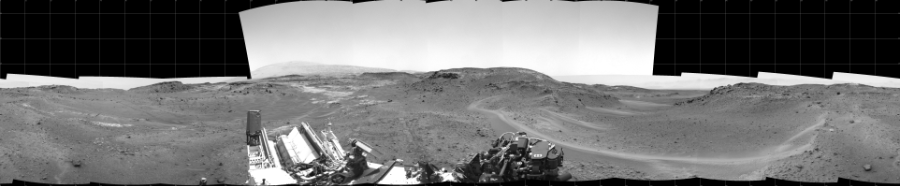 NASA's Mars rover Curiosity took 17 images in Gale Crater using its mast-mounted Left Navigation Camera (Navcam) to create this mosaic. The seam-corrected mosaic provides a 360-degree cylindrical projection panorama of the Martian surface centered at 180 degrees azimuth (measured clockwise from north). Curiosity took the images on April 15, 2015, Sol 956 of the Mars Science Laboratory mission at drive 472, site number 46. The local mean solar time for the image exposures was 1 PM. Each Navcam image has a 45 degree field of view. CREDIT: NASA/JPL-Caltech
