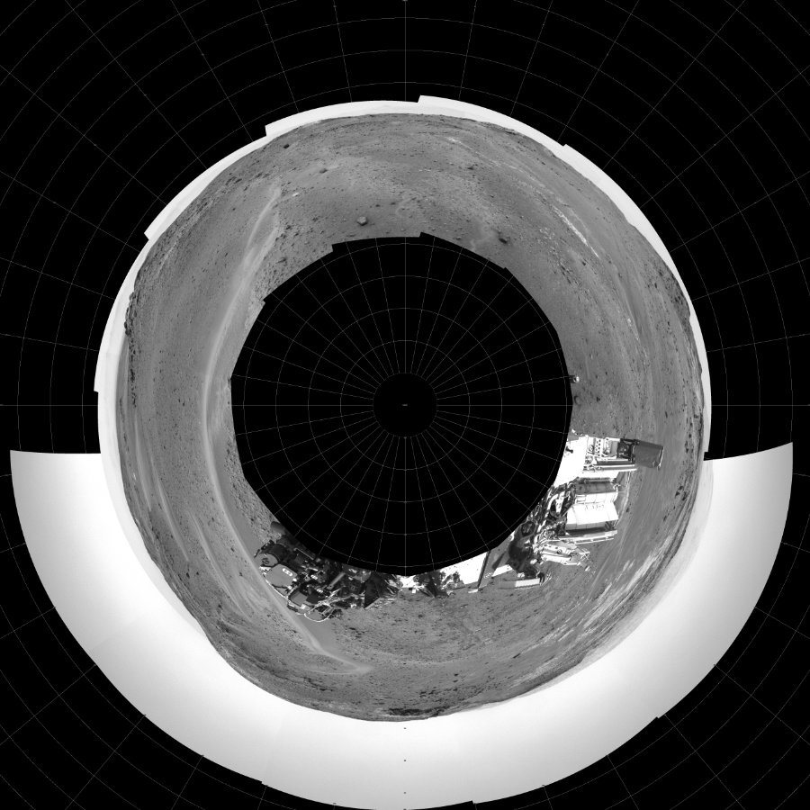 NASA's Mars rover Curiosity took 17 images in Gale Crater using its mast-mounted Left Navigation Camera (Navcam) to create this mosaic. The seam-corrected mosaic provides a polar stereographic projection panorama of the Martian surface with 0 degrees azimuth (measured clockwise from north) at the top of the image. Curiosity took the images on April 15, 2015, Sol 956 of the Mars Science Laboratory mission at drive 472, site number 46. The local mean solar time for the image exposures was 1 PM. Each Navcam image has a 45-degree field of view. CREDIT: NASA/JPL-Caltech