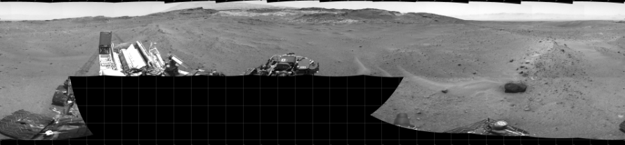 NASA's Mars rover Curiosity took 17 images in Gale Crater using its mast-mounted Left Navigation Camera (Navcam) to create this mosaic. The seam-corrected mosaic provides a 360-degree cylindrical projection panorama of the Martian surface centered at 180 degrees azimuth (measured clockwise from north). Curiosity took the images on April 23, 2015, Sol 963 of the Mars Science Laboratory mission at drive 1812, site number 46. The local mean solar time for the image exposures was 1 PM. Each Navcam image has a 45 degree field of view. CREDIT: NASA/JPL-Caltech