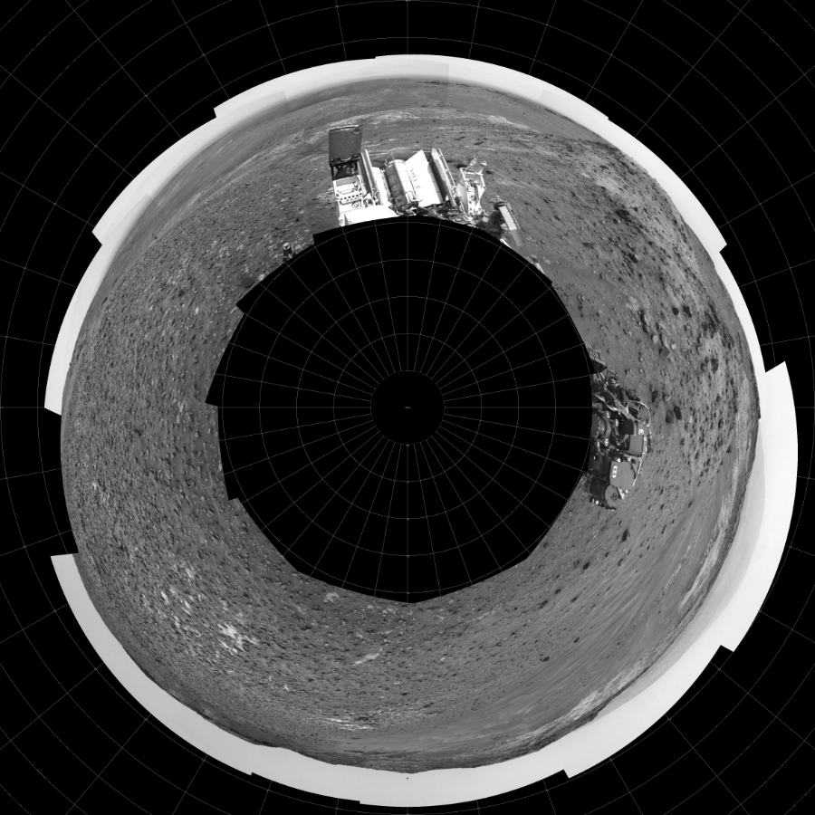 NASA's Mars rover Curiosity took 17 images in Gale Crater using its mast-mounted Left Navigation Camera (Navcam) to create this mosaic. The seam-corrected mosaic provides a polar stereographic projection panorama of the Martian surface with 0 degrees azimuth (measured clockwise from north) at the top of the image. Curiosity took the images on May 11, 2015, Sol 981 of the Mars Science Laboratory mission at drive 1452, site number 47. The local mean solar time for the image exposures was 12 PM. Each Navcam image has a 45-degree field of view. CREDIT: NASA/JPL-Caltech