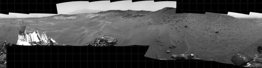 NASA's Mars rover Curiosity took 22 images in Gale Crater using its mast-mounted Left Navigation Camera (Navcam) to create this mosaic. The seam-corrected mosaic provides a 360-degree cylindrical projection panorama of the Martian surface centered at 180 degrees azimuth (measured clockwise from north). Curiosity took the images on May 13, 2015, Sol 983 of the Mars Science Laboratory mission at drive 1632, site number 47. The local mean solar time for the image exposures was 1 PM. Each Navcam image has a 45 degree field of view. CREDIT: NASA/JPL-Caltech