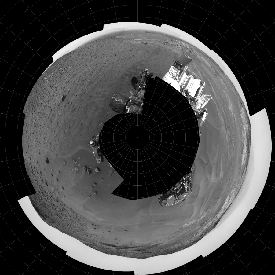 NASA's Mars rover Curiosity took 22 images in Gale Crater using its mast-mounted Left Navigation Camera (Navcam) to create this mosaic. The seam-corrected mosaic provides a polar stereographic projection panorama of the Martian surface with 0 degrees azimuth (measured clockwise from north) at the top of the image. Curiosity took the images on May 13, 2015, Sol 983 of the Mars Science Laboratory mission at drive 1632, site number 47. The local mean solar time for the image exposures was 1 PM. Each Navcam image has a 45-degree field of view. CREDIT: NASA/JPL-Caltech