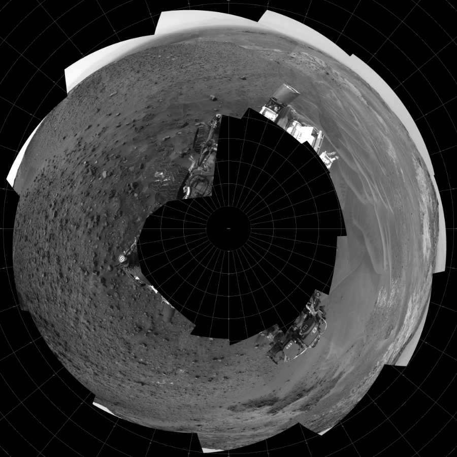 NASA's Mars rover Curiosity took 17 images in Gale Crater using its mast-mounted Left Navigation Camera (Navcam) to create this mosaic. The seam-corrected mosaic provides a polar stereographic projection panorama of the Martian surface with 0 degrees azimuth (measured clockwise from north) at the top of the image. Curiosity took the images on May 14, 2015, Sol 984 of the Mars Science Laboratory mission at drive 0, site number 48. The local mean solar time for the image exposures was 2 PM. Each Navcam image has a 45-degree field of view. CREDIT: NASA/JPL-Caltech
