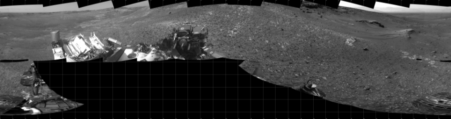 NASA's Mars rover Curiosity took 17 images in Gale Crater using its mast-mounted Left Navigation Camera (Navcam) to create this mosaic. The seam-corrected mosaic provides a 360-degree cylindrical projection panorama of the Martian surface centered at 180 degrees azimuth (measured clockwise from north). Curiosity took the images on May 20, 2015, Sol 990 of the Mars Science Laboratory mission at drive 876, site number 48. The local mean solar time for the image exposures was from 2 PM to 3 PM. Each Navcam image has a 45 degree field of view. CREDIT: NASA/JPL-Caltech