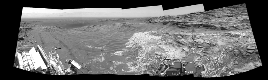 NASA's Mars rover Curiosity took 5 images in Gale Crater using its mast-mounted Left Navigation Camera (Navcam) to create this mosaic. The seam-corrected mosaic provides a 189-degree cylindrical-perspective projection panorama of the Martian surface suitable for stereo viewing, centered at 273 degrees azimuth (measured clockwise from north). This single-eye view must be combined with the partner right image to be viewed in stereo.  Curiosity took the images on June 30, 2015, Sol 1030 of the Mars Science Laboratory mission at drive 1600, site number 48. The local mean solar time for the image exposures was 2 PM. Each Navcam image has a 45-degree field of view. CREDIT: NASA/JPL-Caltech