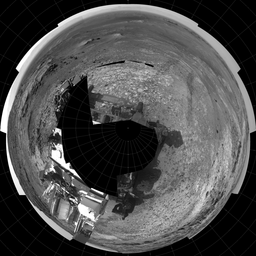 NASA's Mars rover Curiosity took 19 images in Gale Crater using its mast-mounted Left Navigation Camera (Navcam) to create this mosaic. The seam-corrected mosaic provides a polar stereographic projection panorama of the Martian surface with 0 degrees azimuth (measured clockwise from north) at the top of the image. Curiosity took the images on July 08, 2015, Sol 1037 of the Mars Science Laboratory mission at drive 1964, site number 48. The local mean solar time for the image exposures was 3 PM. Each Navcam image has a 45-degree field of view. CREDIT: NASA/JPL-Caltech
