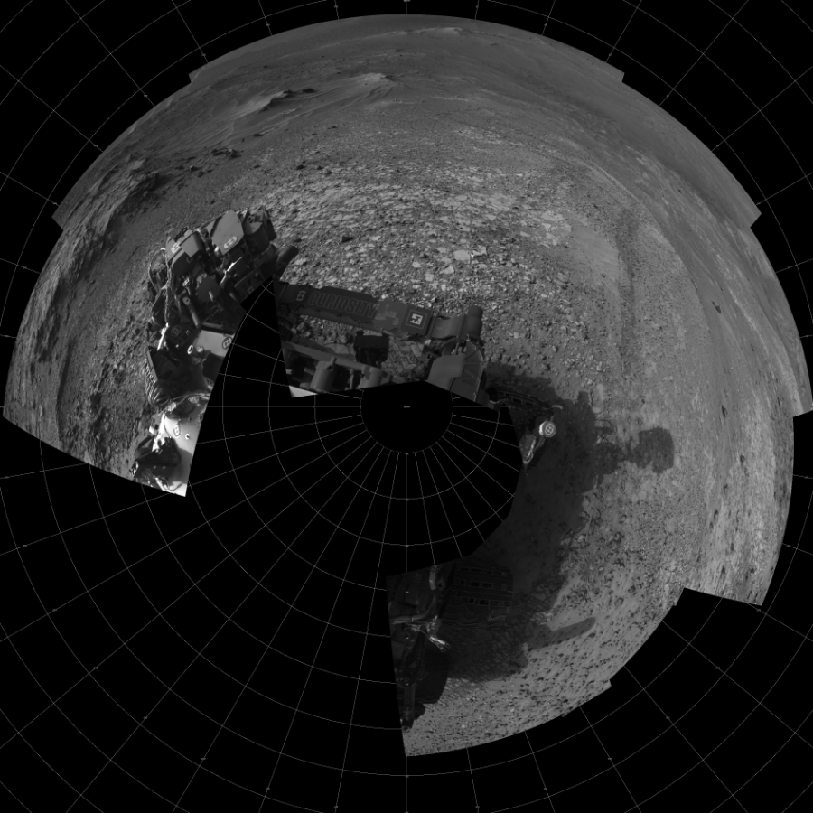 NASA's Mars rover Curiosity took 14 images in Gale Crater using its mast-mounted Left Navigation Camera (Navcam) to create this mosaic. The seam-corrected mosaic provides a polar stereographic projection panorama of the Martian surface with 0 degrees azimuth (measured clockwise from north) at the top of the image. Curiosity took the images on July 10, 2015, Sol 1039 of the Mars Science Laboratory mission at drive 1970, site number 48. The local mean solar time for the image exposures was 4 PM. Each Navcam image has a 45-degree field of view. CREDIT: NASA/JPL-Caltech